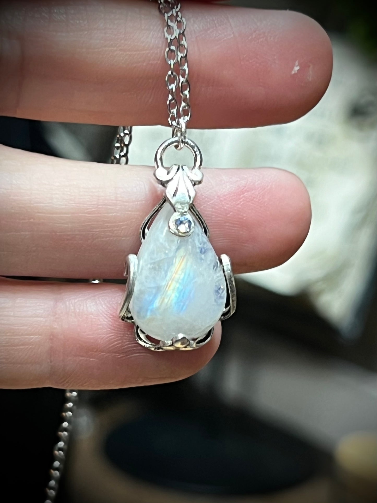 Teardrop moonstone pendant necklace with antique victorian filigree wrap