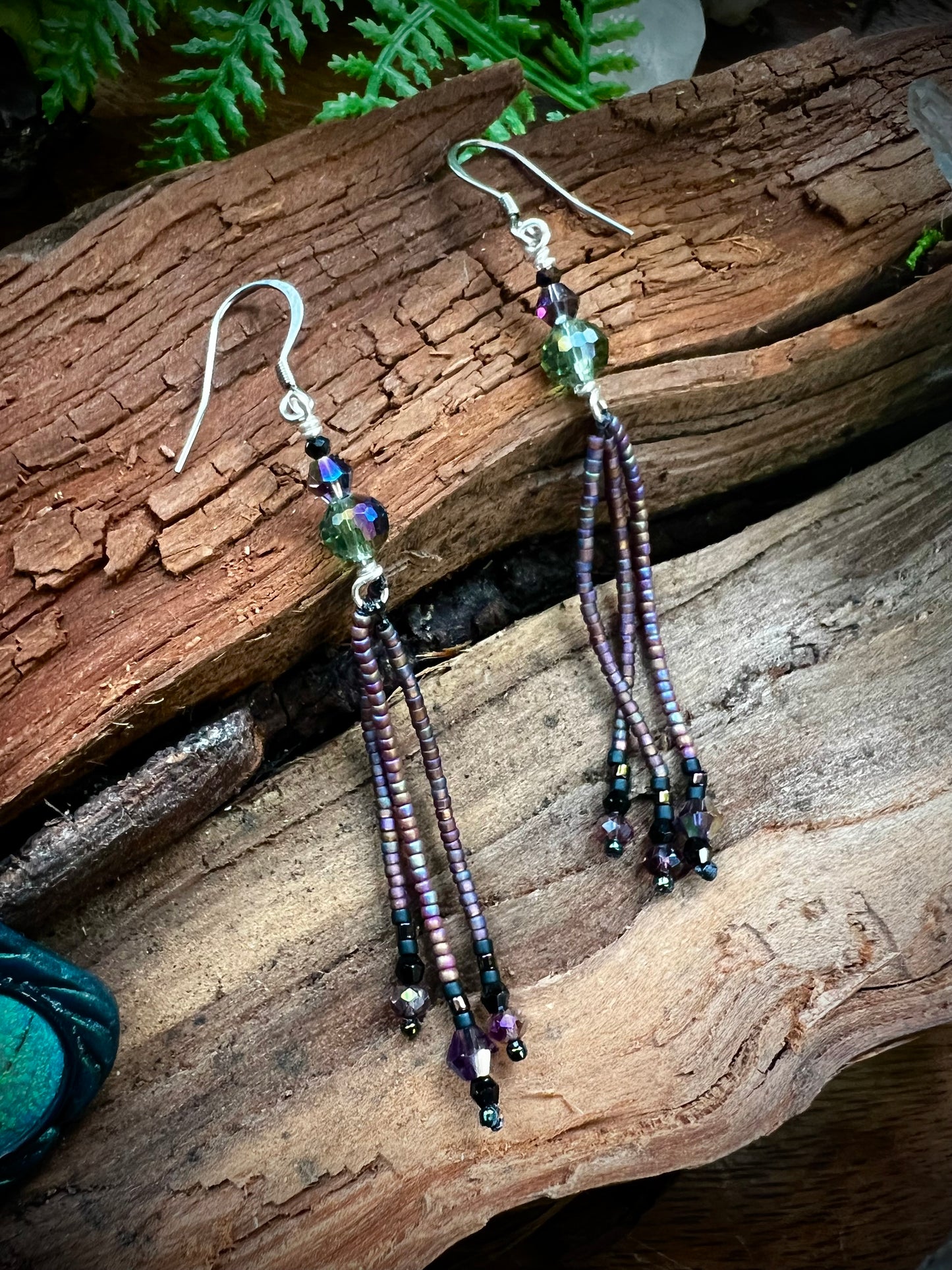 Dreamlike fringe earrings with rainbow crystal accents and seed bead drapes
