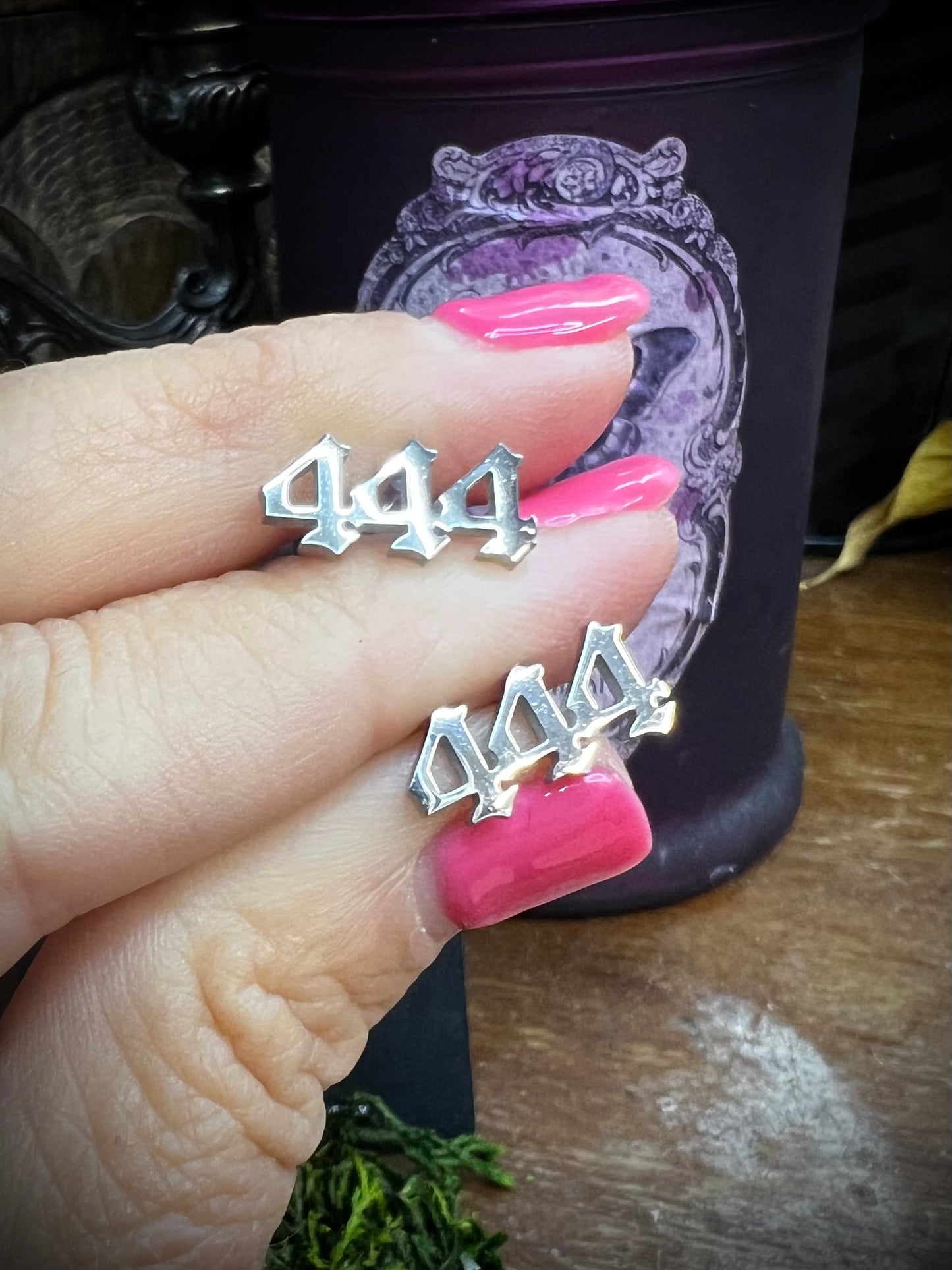 Numerology 444 stud earrings with magical background
