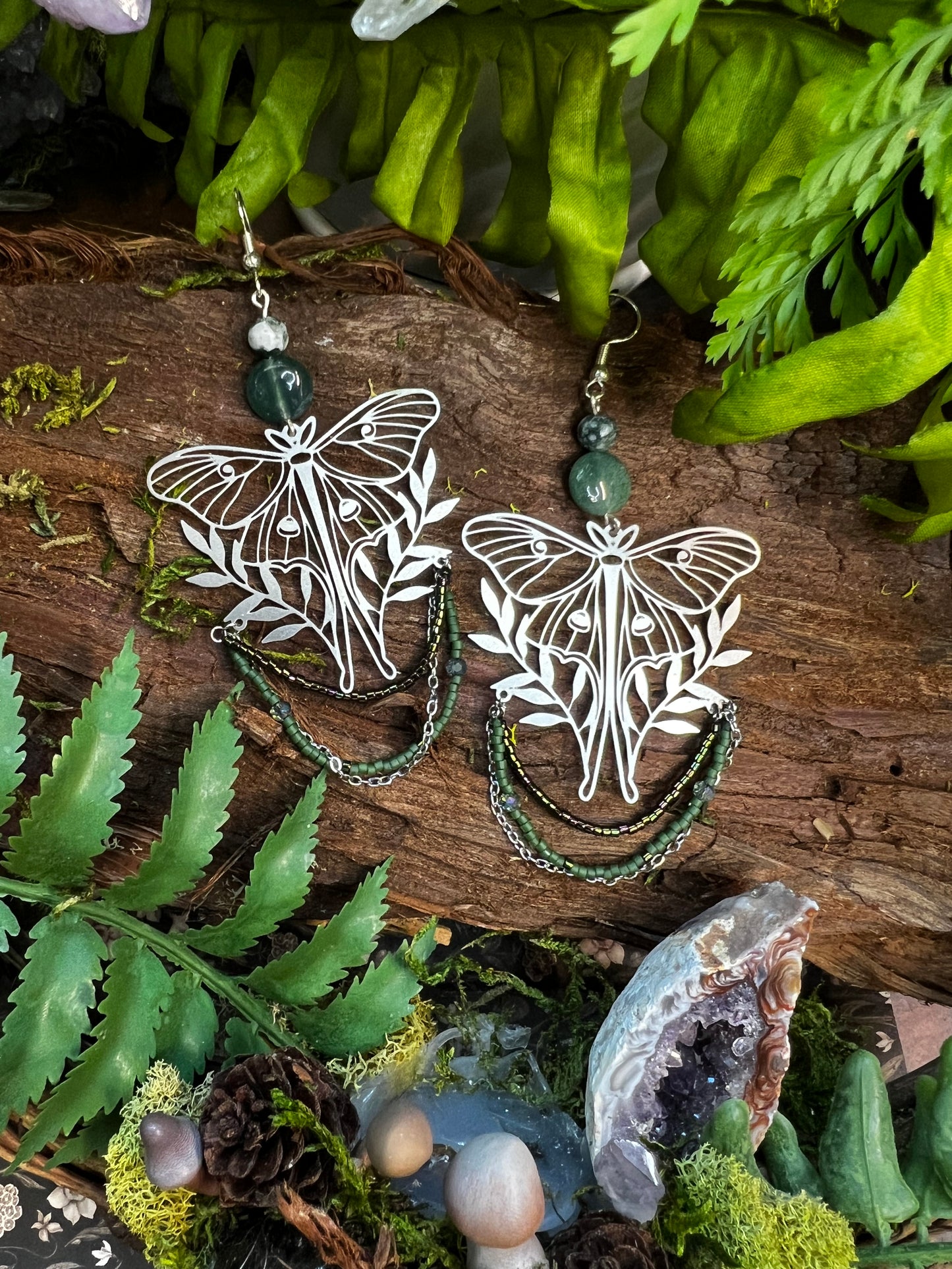 Forest queen earrings with moss agate and moon moth charms surrounded by crystals