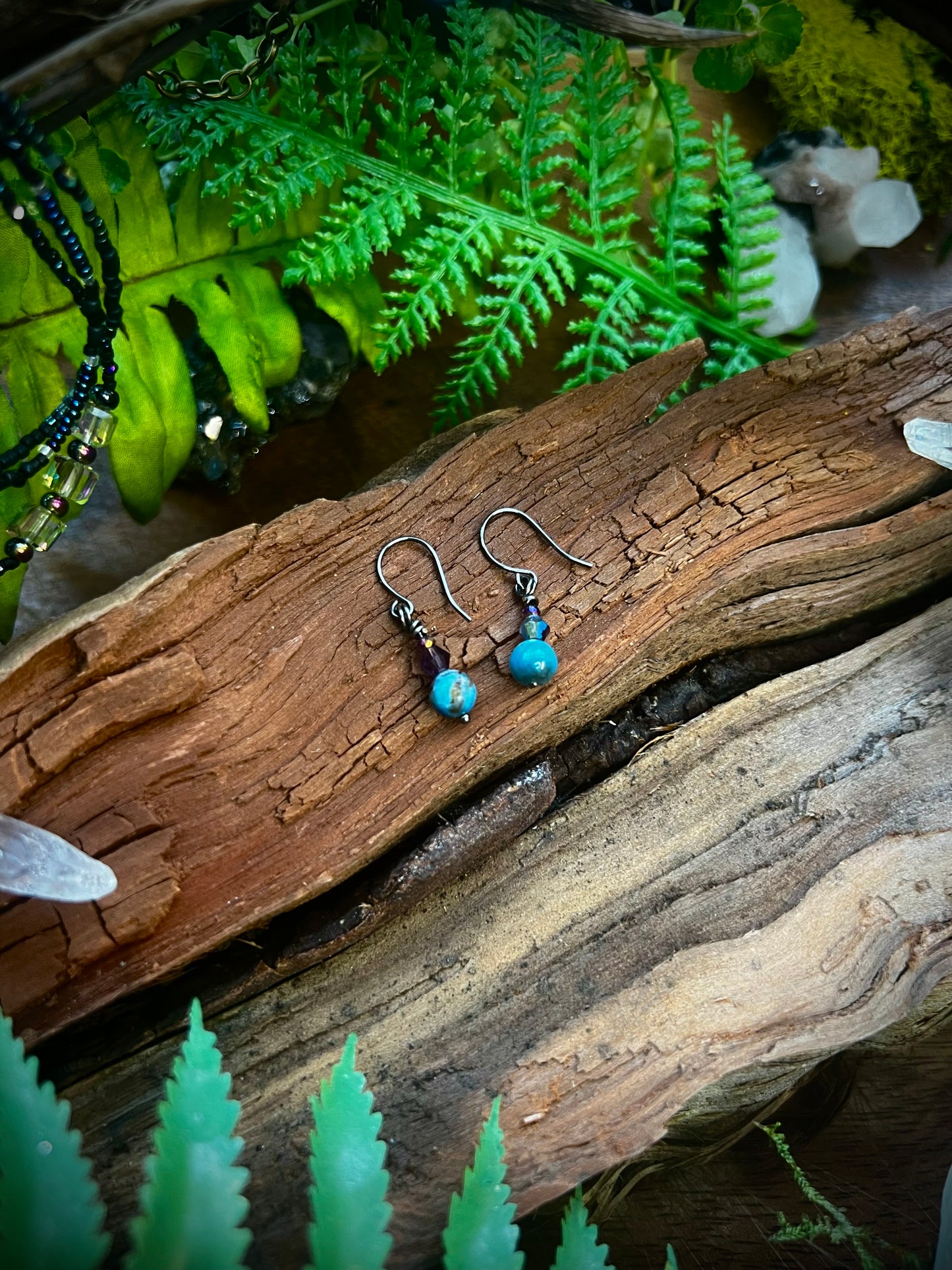 Apatite gemstone dangle earrings with iridescent crystal accents