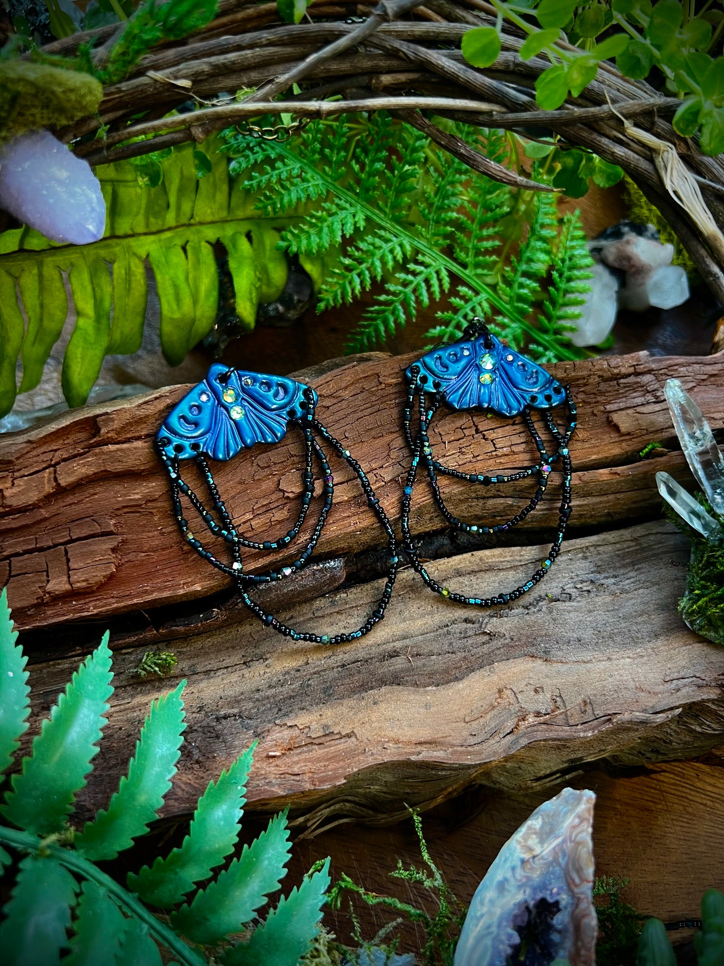 Lightweight moth statement earrings with layered seed bead strands