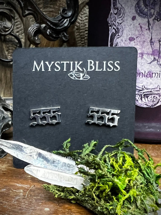 555 angel number stud earrings on Mystik Bliss card with quartz crystals and moss
