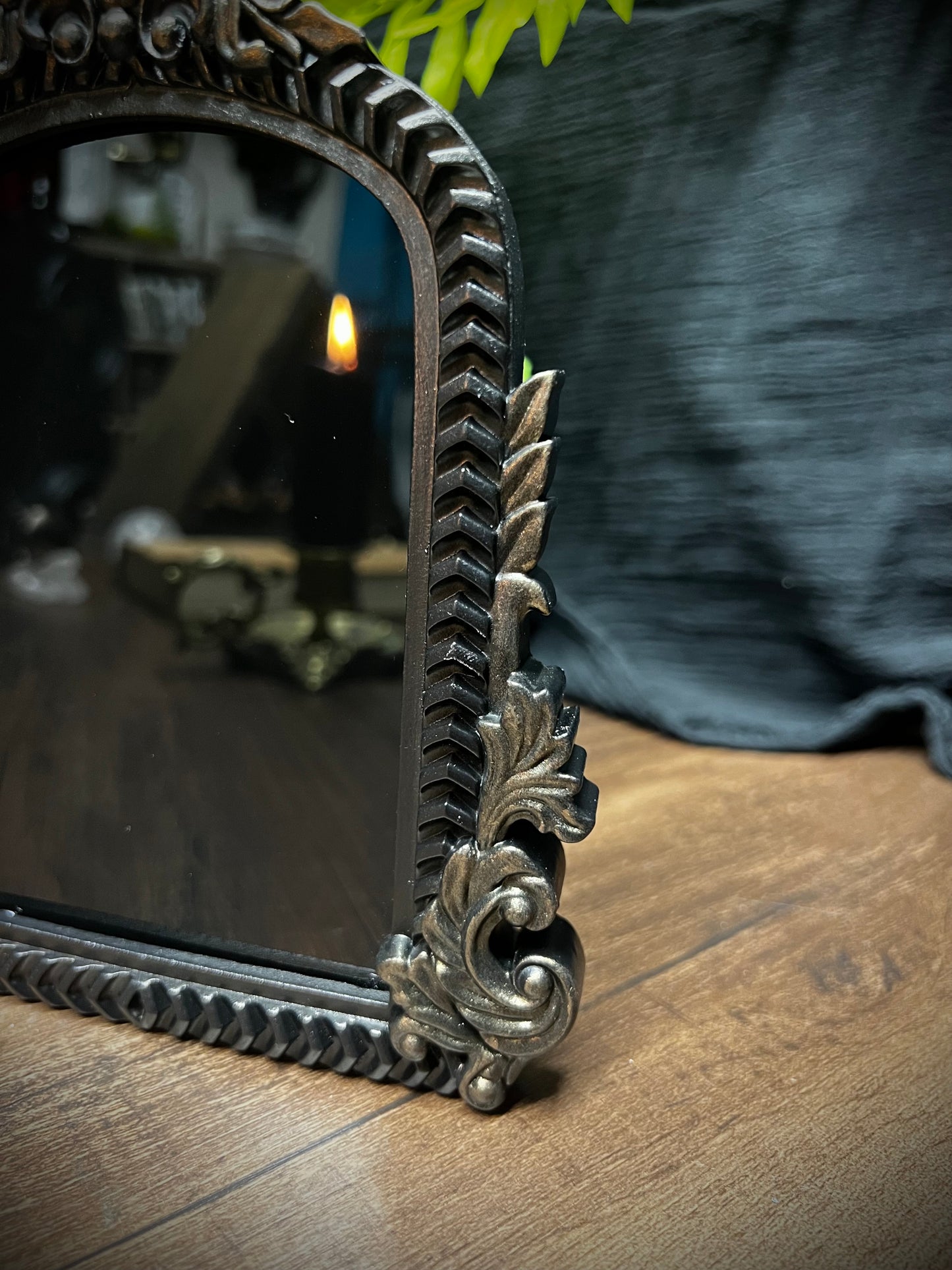 Small Fancy Black Scrying Mirror Ornate Scrolls Black and Bronze Detail on a Witch’s Altar Divination Magickal Mirror