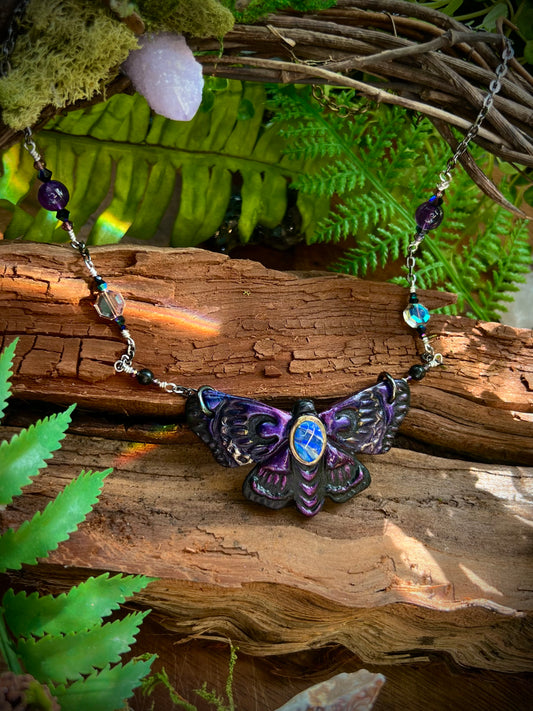 Hand-sculpted polymer clay moth necklace with Australian opal centerpiece