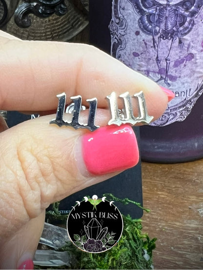 Minimalist numerology 111 earrings shown with enchanted altar background