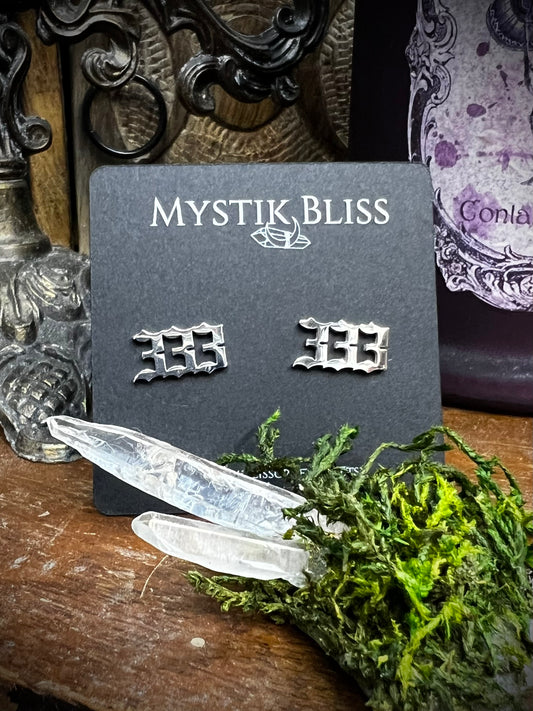 333 angel number stud earrings on Mystik Bliss card with quartz crystals and moss