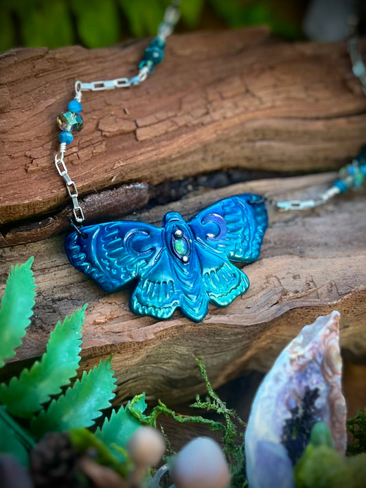 Handcrafted teal moth necklace with opal and apatite gemstones
