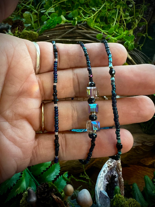 Trio of aurora seed bead stacking stretch bracelets with iridescent shine
