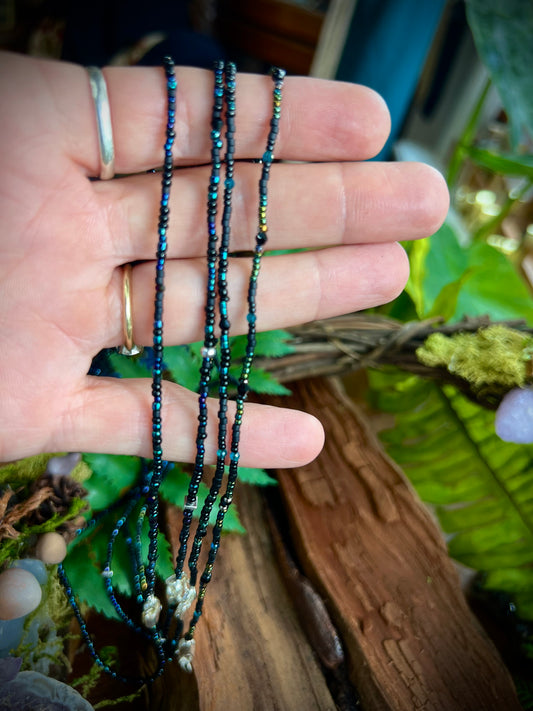 Moonlit Dreams Seed Bead Necklace minimalist matte black seed bead necklace with aurora accents