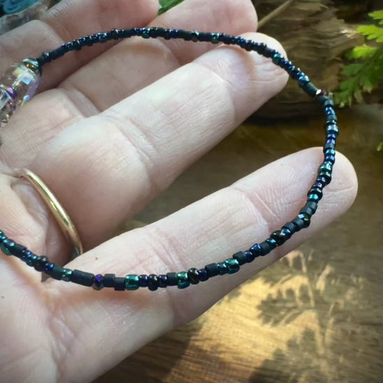 Iridescent aurora crystal bracelet with shimmering rainbow glow