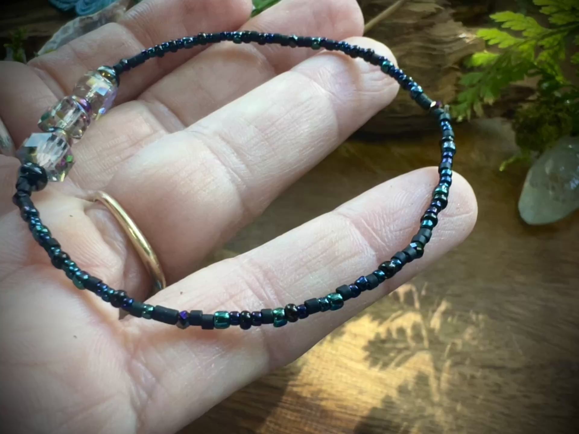Iridescent aurora crystal bracelet with shimmering rainbow glow