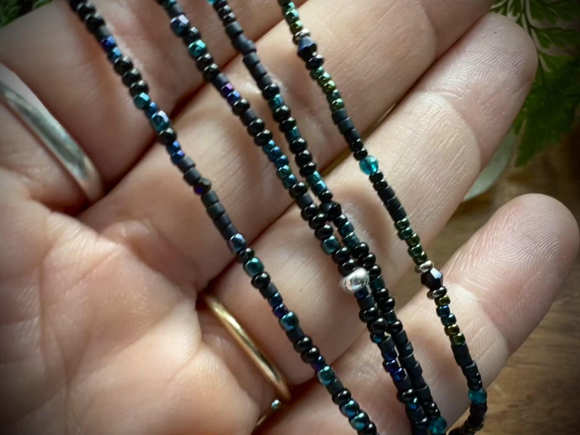 Group shot of 4 Moonlit Dreams Seed Bead Necklaces – dainty layering strands with aurora crystals