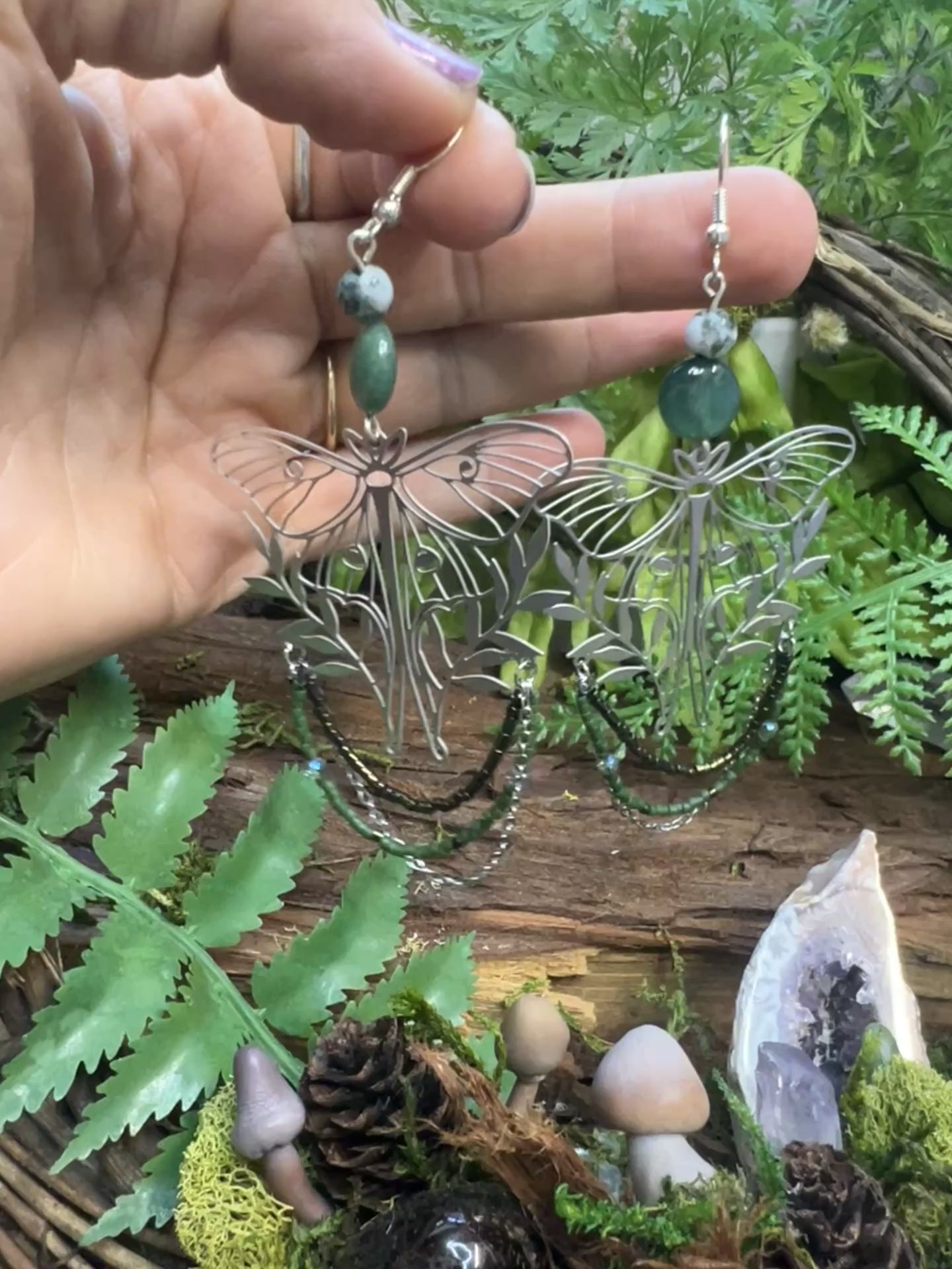 Bold yet elegant moss agate earrings with forest-inspired moth and chain details